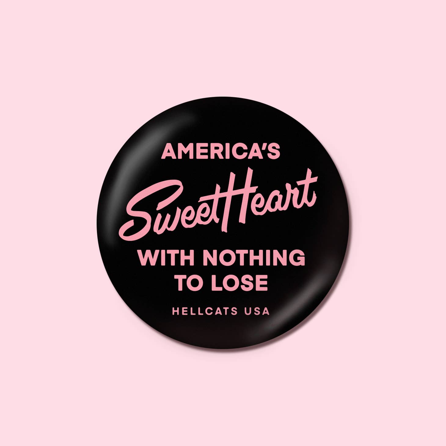 Black button with pink text reading, "America's SweetHeart with nothing to lose"
