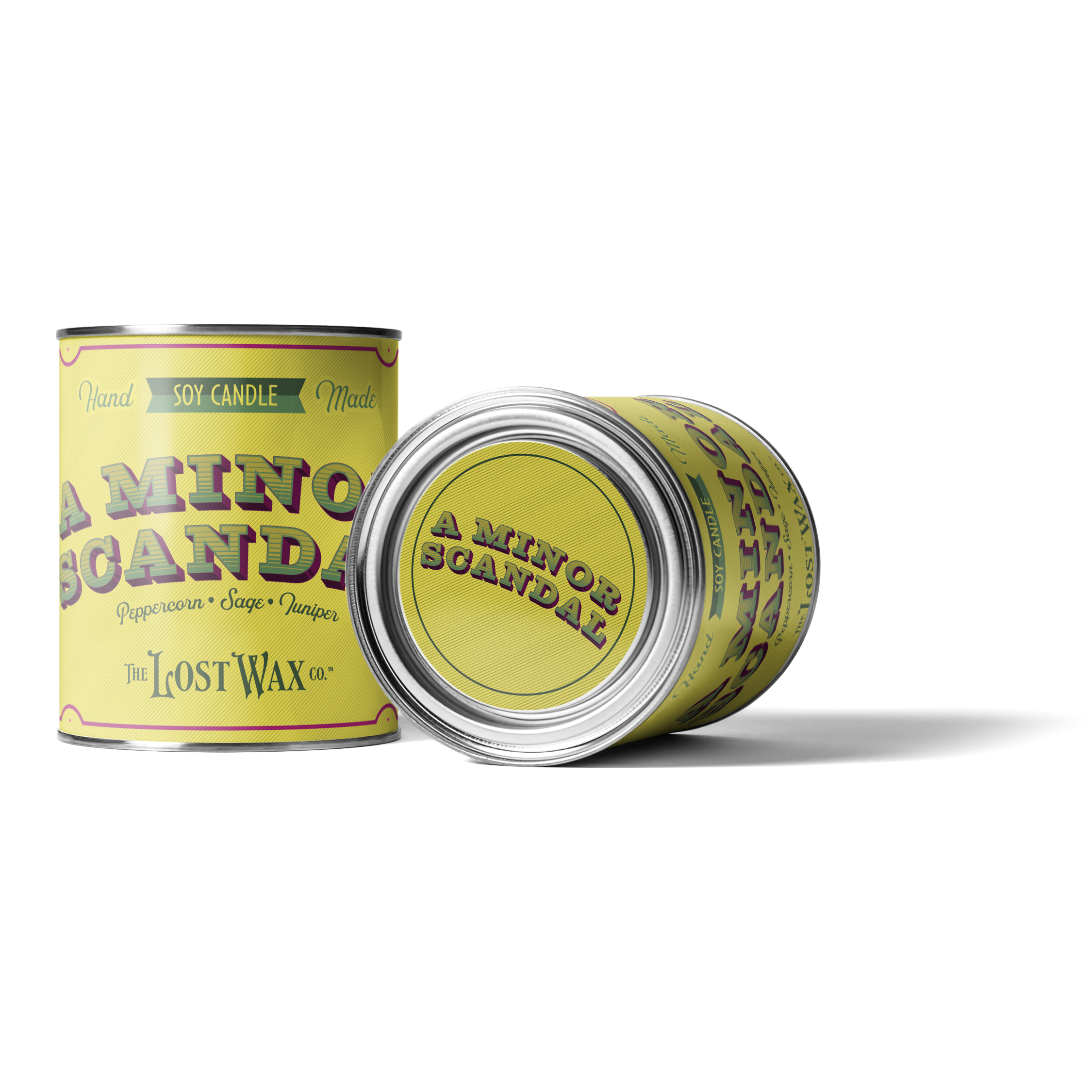 Two cans of 'A Minor Scandal' candle by The Lost Wax Co. on a white background