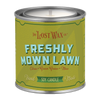 Candle canister labeled 'Freshly Mown Lawn' by Frost Wax on a white background