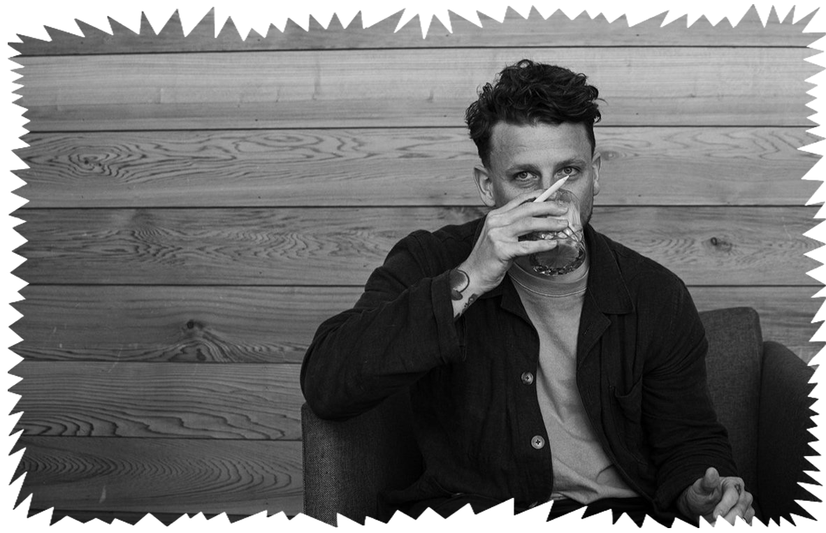 Black and white photograph of designer Joshua Noom