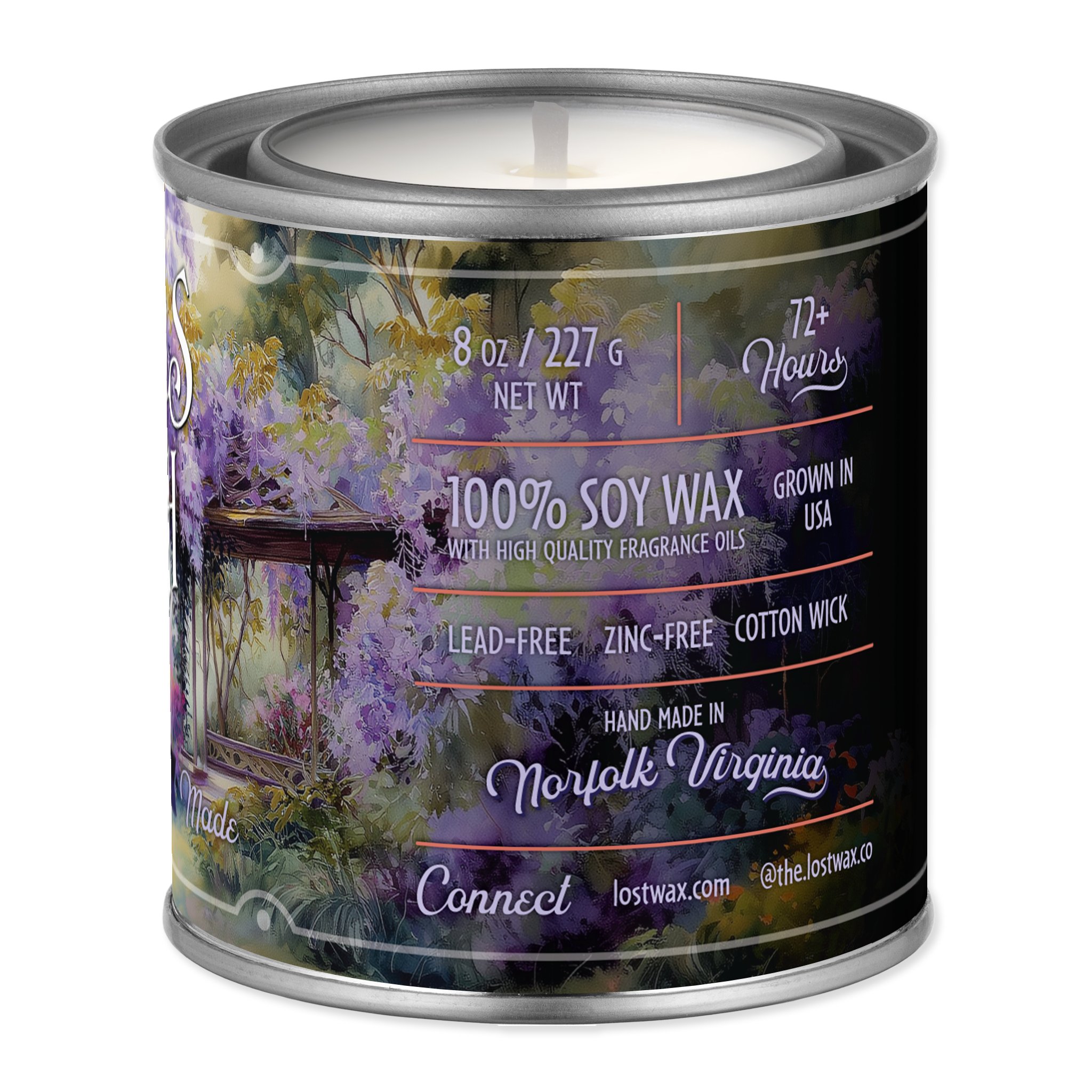 Candle in a tin with a scenic label on a white background