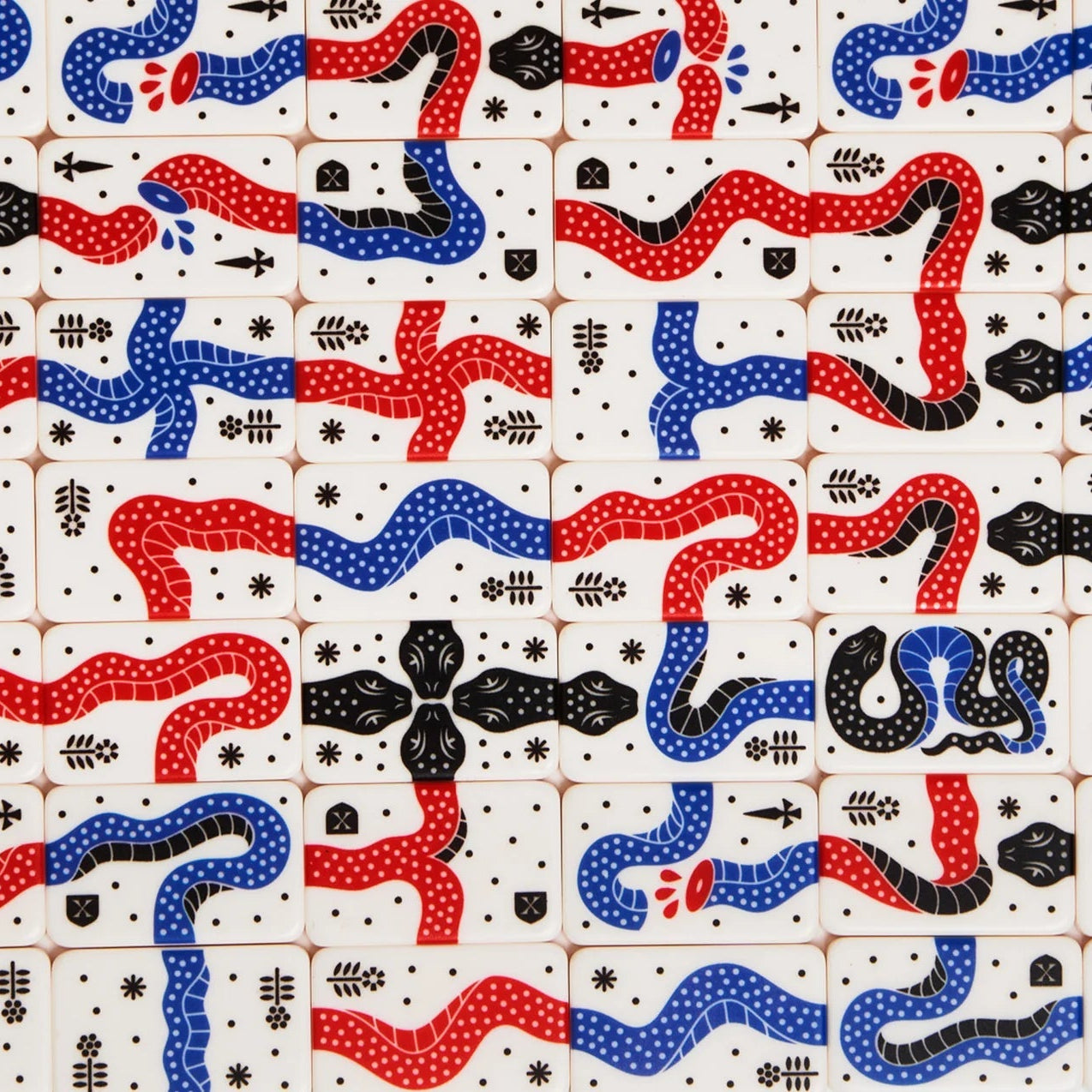 Grid of tiles printed with abstract snake designs in red, blue, and black.