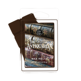 Wax Melt package with 'The Antiquarian' design featuring stacked books on a white background