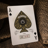 Playing card with ace of spades design on a textured surface