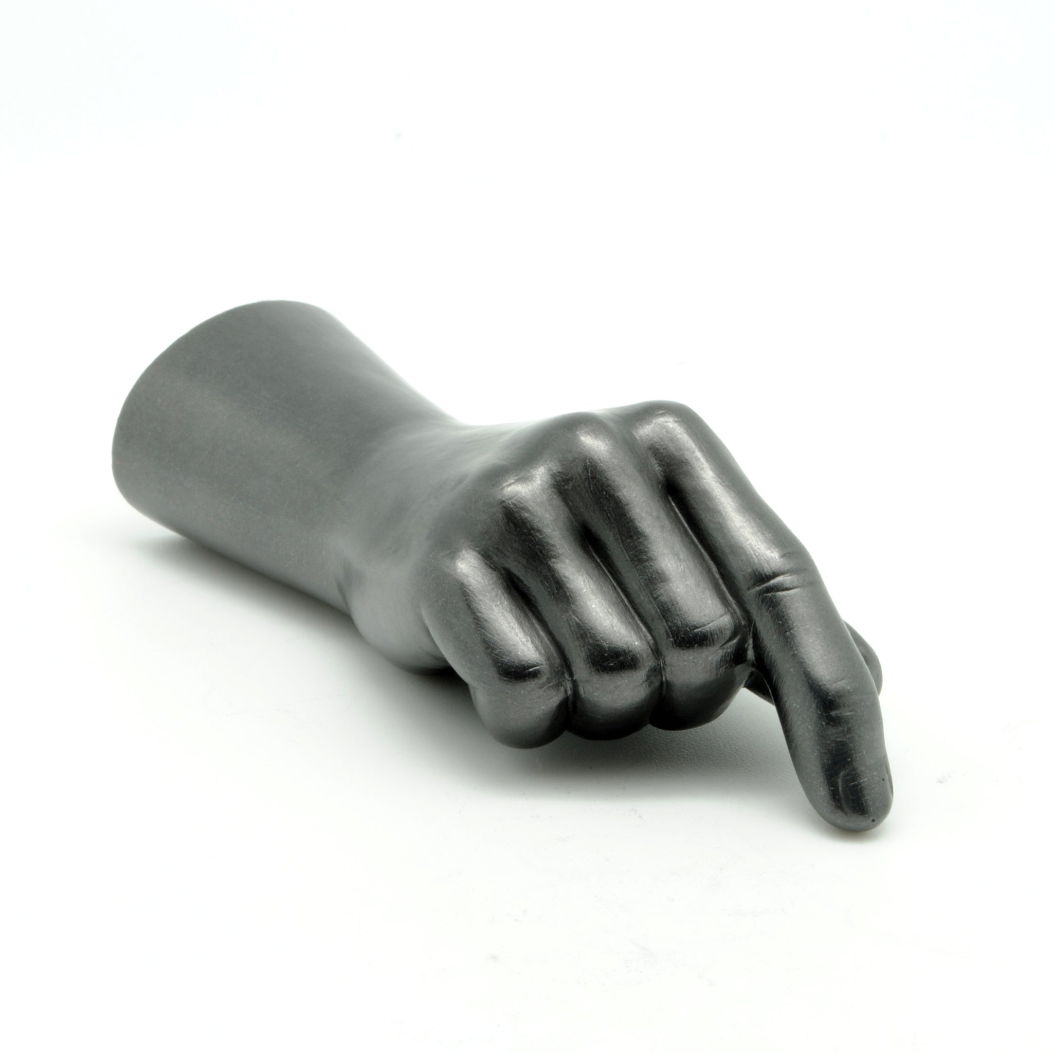 Graphite hand sculpture pointing with a white background