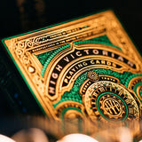 Close-up of ornate box of playing cards branded "High Victorian"