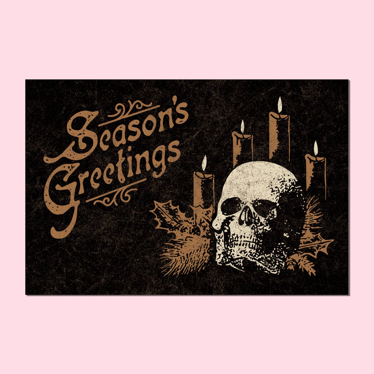Black postcard with an ivory & gold illustration of a skull and candles, and the legend "Season's Greetings"