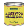 Candle canister labeled 'A Minor Scandal' by The Lost Wax Co. on a white background