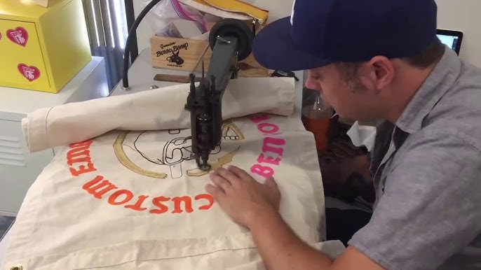 Ben Goetting using a chainstitch machine