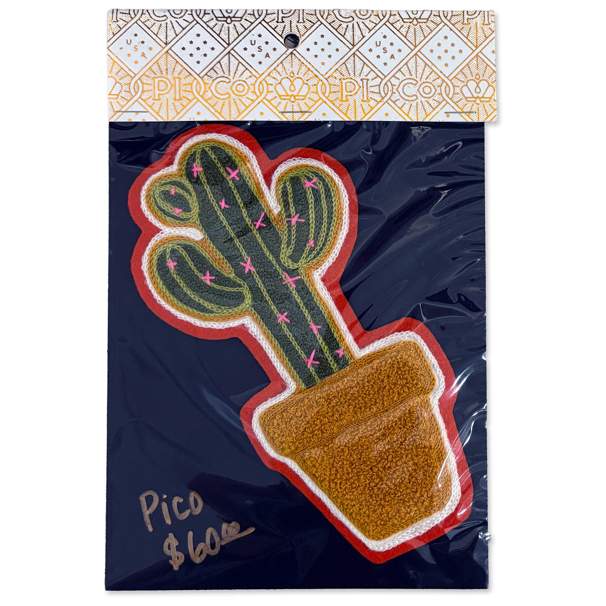 A packaged decorative patch featuring a green cactus in a brown pot with a red and white border, attached to a dark navy backing card with a patterned header. Handwritten text on the card reads 'Pico $6.