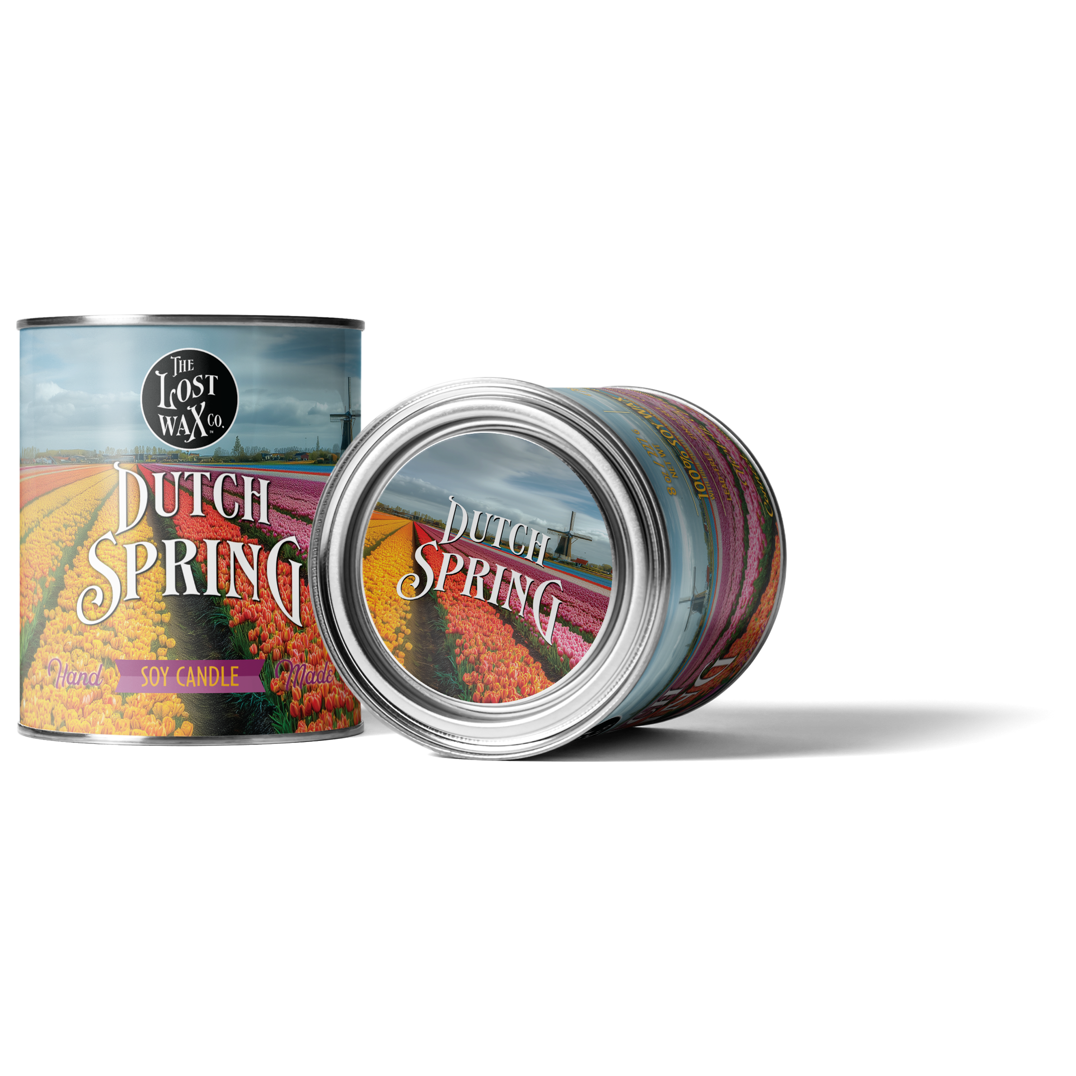 Two cans of 'Dutch Spring' candles by The Lost Wax Co. on a white background