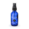 Blue spray bottle labeled 'Enchanted Forest' on a white background