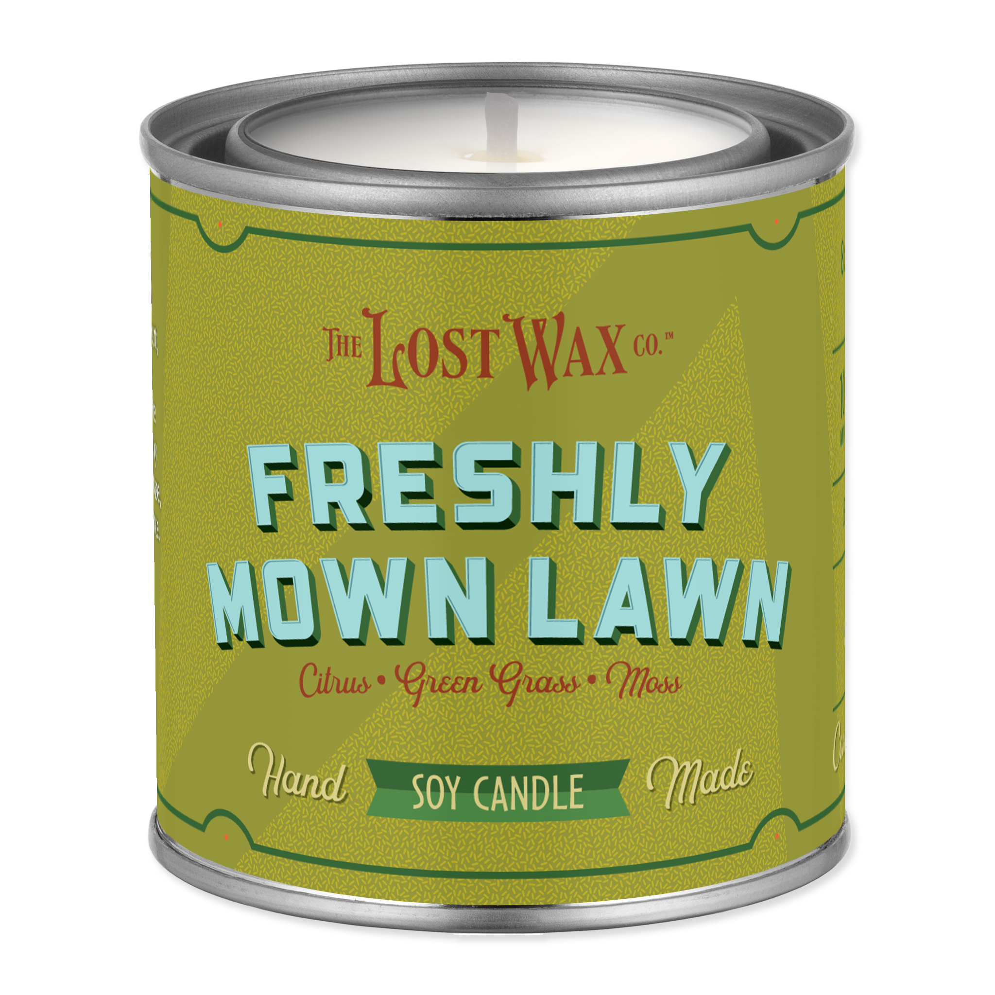 Candle canister labeled 'Freshly Mown Lawn' by Frost Wax on a white background