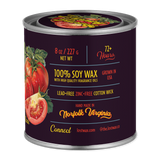 Can of soy wax with tomato design and text on a white background