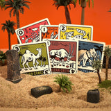 Desperate Oasis game cards in a desert diorama setting