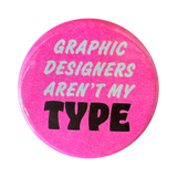 Graphic Designers Aren't My TYPE button in white and black text on a fluorescent pink background.