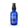Blue spray bottle labeled 'Tropical Citrus' on a white background