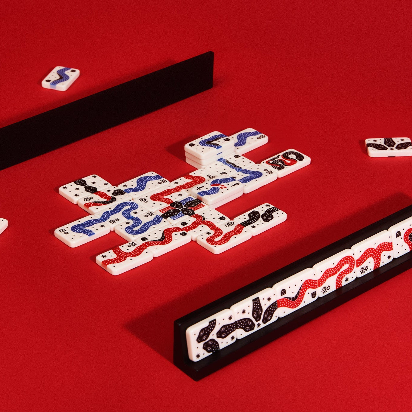 Board game pieces on a red background