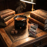 Wax melter on a wooden desk with old books and a lamp in the background