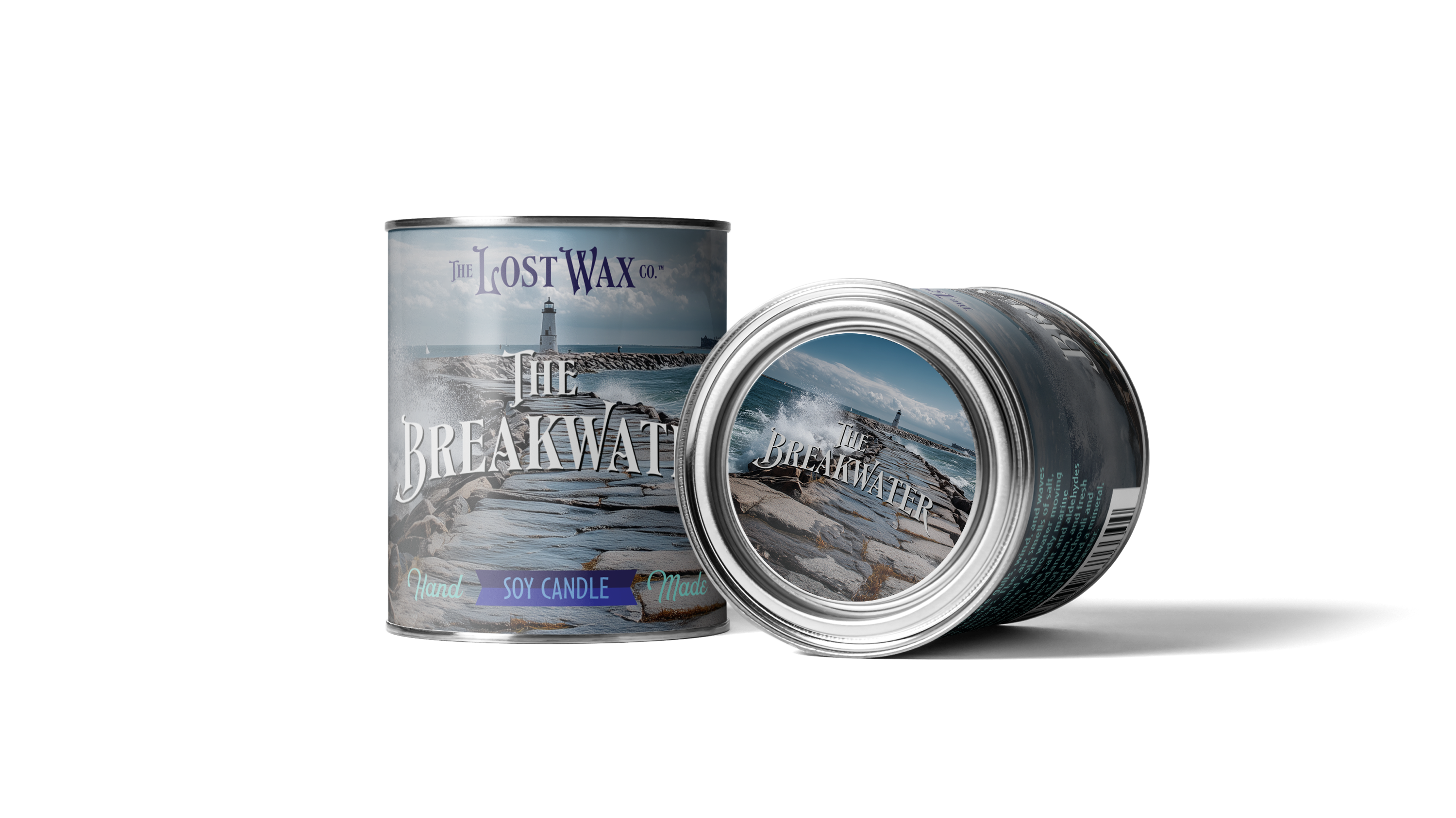 Two cans of 'The Lost Wax' Breakwater candle on a white background