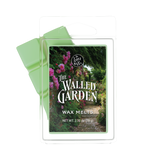 Wax melts packaging with 'The Walled Garden' design on a white background