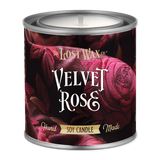 Candle in a decorative tin labeled 'Velvet Rose' from The Lost Wax Co.